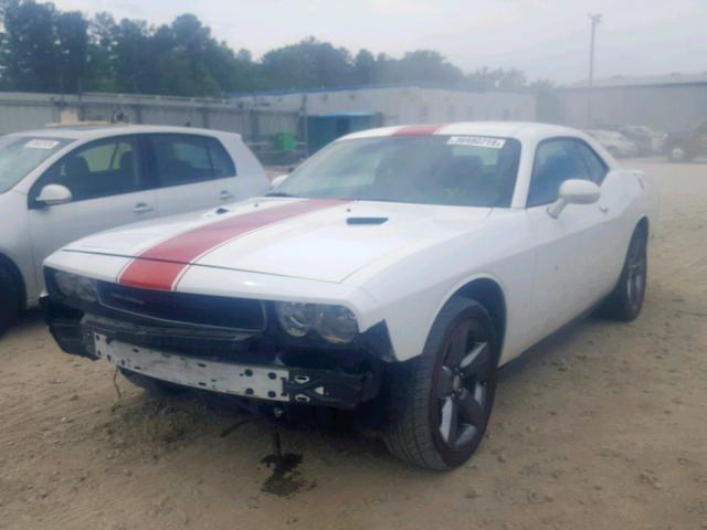 Купить бу DODGE CHALLENGER 3.6 2013 года в США