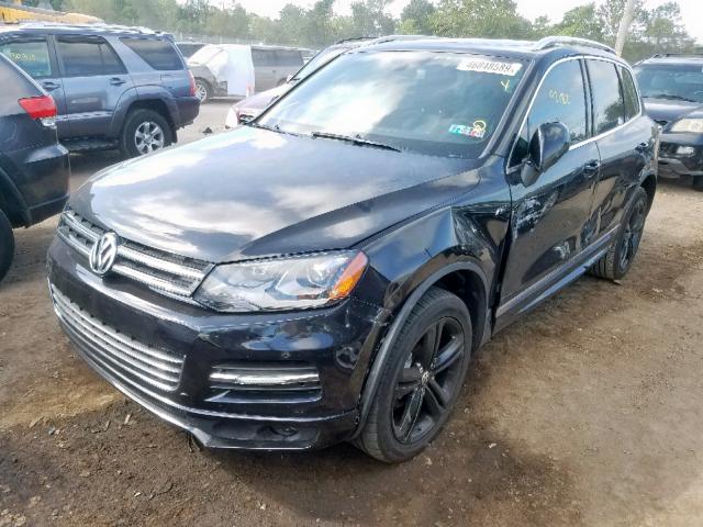 Купить бу VOLKSWAGEN TOUAREG 3.6 2014 года в США