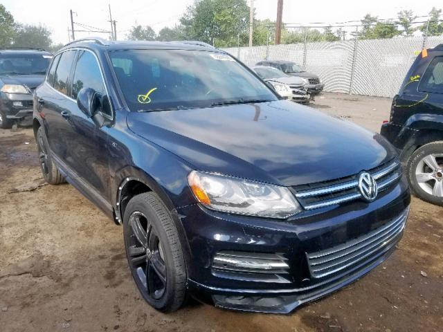 Купить бу VOLKSWAGEN TOUAREG 3.6 2014 года в США