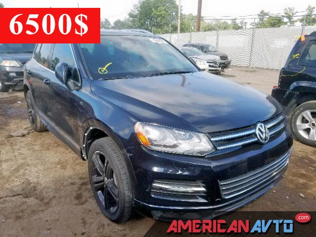 Купить бу VOLKSWAGEN TOUAREG 3.6 2014 года в США