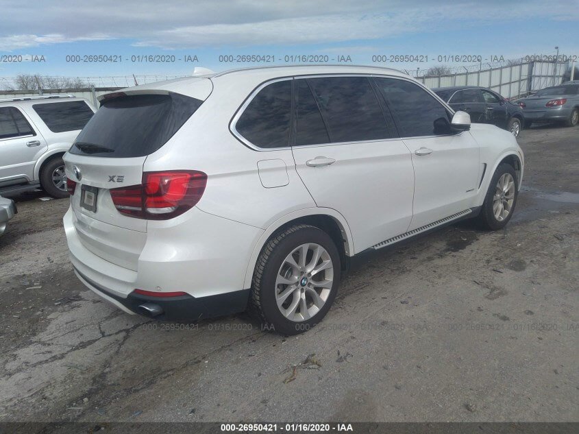 Купить бу BMW X5 3.0 2014 года в США