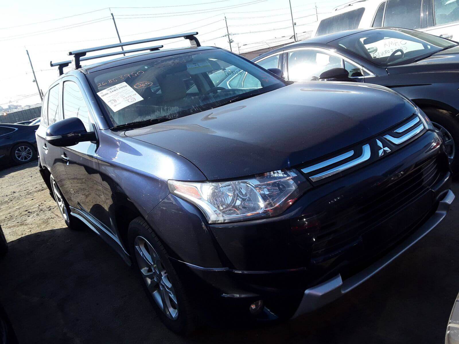 Купить бу MITSUBISHI OUTLANDER 2.4 2013 года в США