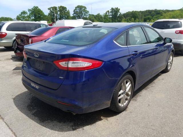 Купить бу FORD FUSION 2014 года в США