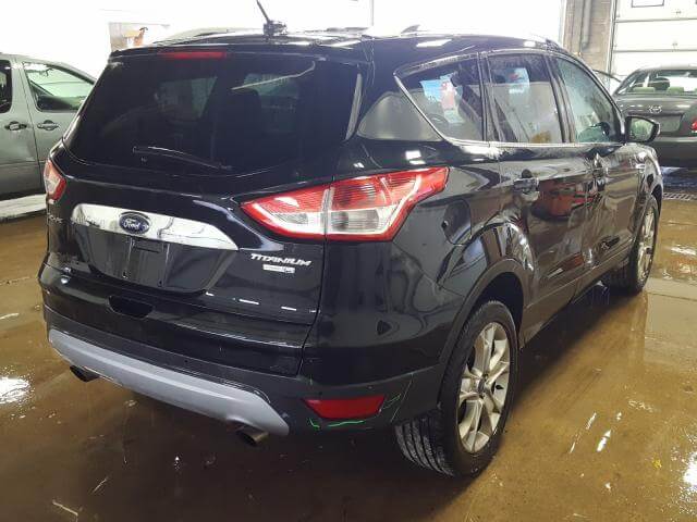 Купить бу FORD ESCAPE TITANIUM 2014 года в США