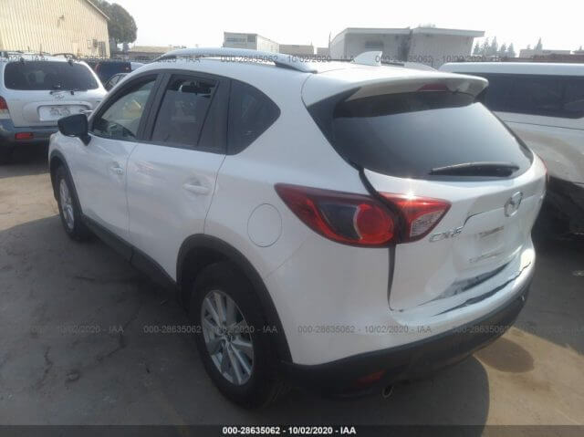 Купить бу MAZDA CX-5 TOURING 2015 года в США