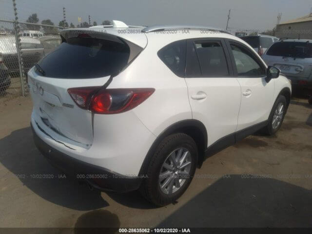 Купить бу MAZDA CX-5 TOURING 2015 года в США