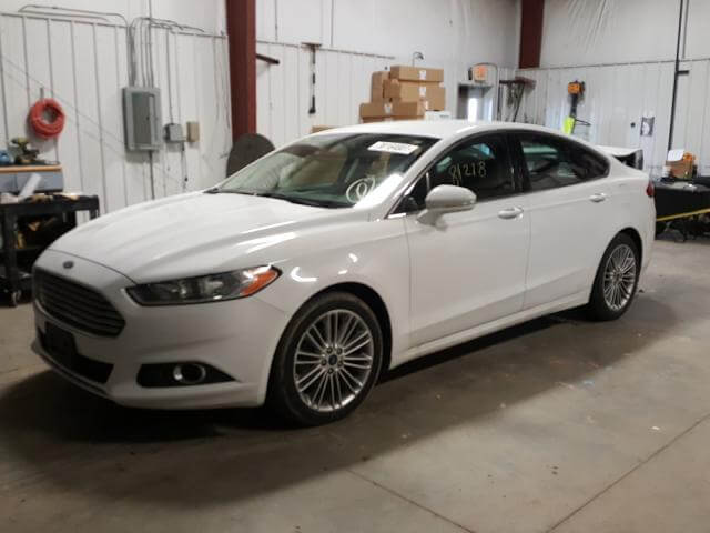 Купить бу FORD FUSION 2013 года в США