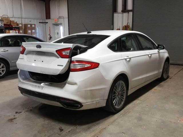 Купить бу FORD FUSION 2013 года в США