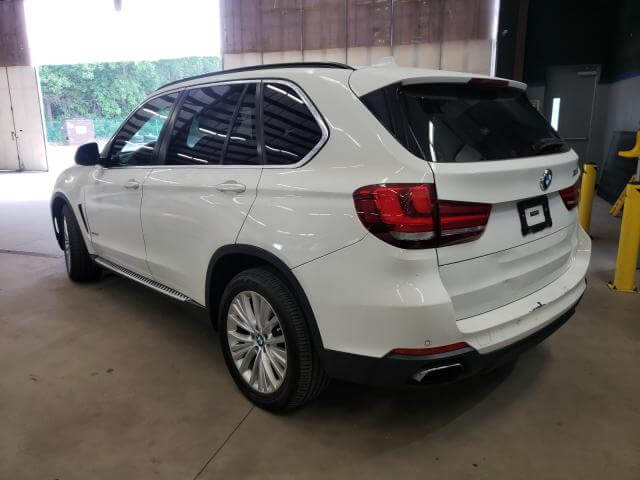 Купить бу BMW X5 XDRIVE50I 2015 года в США