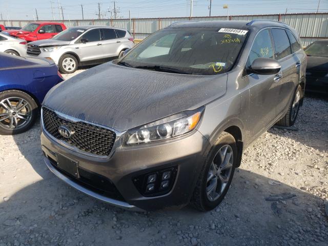 Купить бу KIA SORENTO SX 2016 года в США