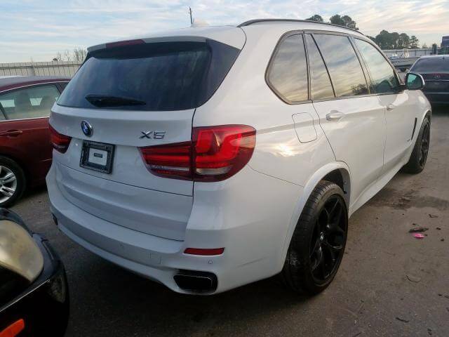 Купить бу BMW X5 XDRIVE50I 2014 года в США