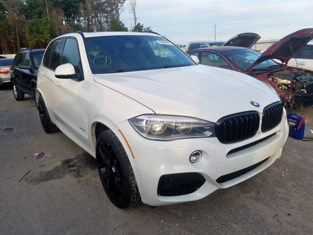 Купить бу BMW X5 XDRIVE50I 2014 года в США