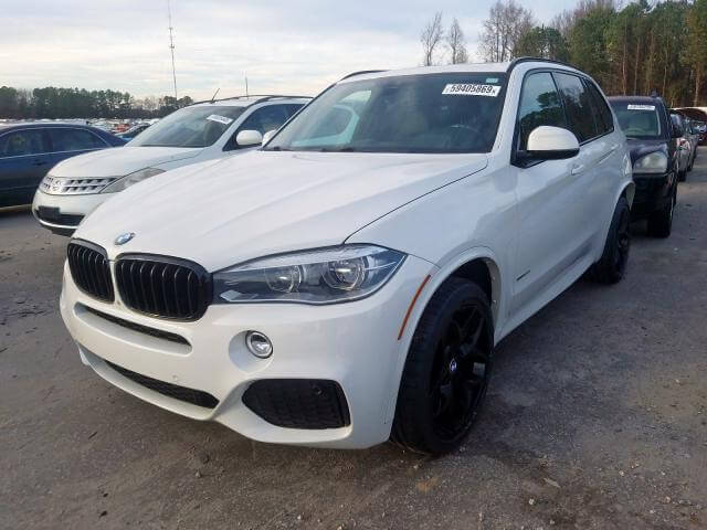 Купить бу BMW X5 XDRIVE50I 2014 года в США