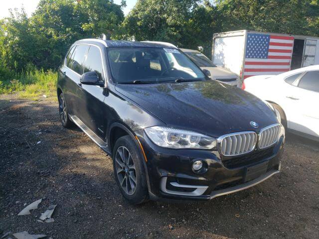 Купить бу BMW X5 XDRIVE35I 2014 года в США