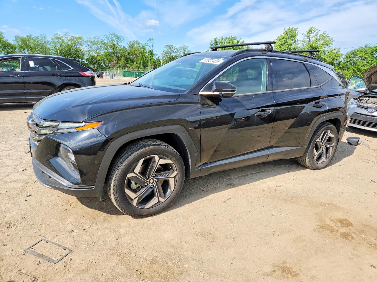 Купить б/у HYUNDAI TUCSON HYBRID 2022 года из США