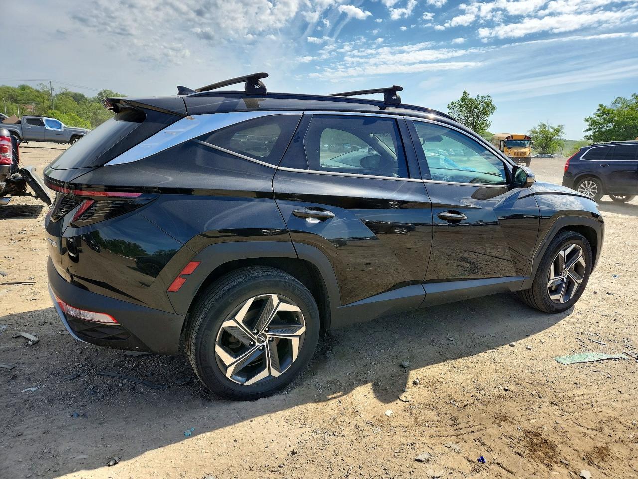 Купить б/у HYUNDAI TUCSON HYBRID 2022 года из США