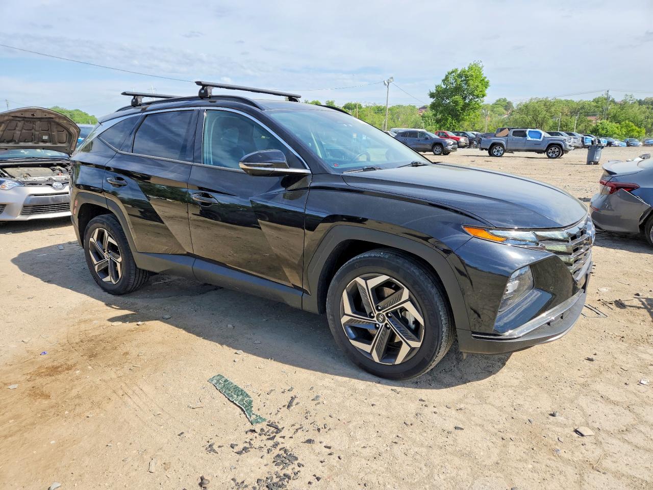 Купить б/у HYUNDAI TUCSON HYBRID 2022 года из США