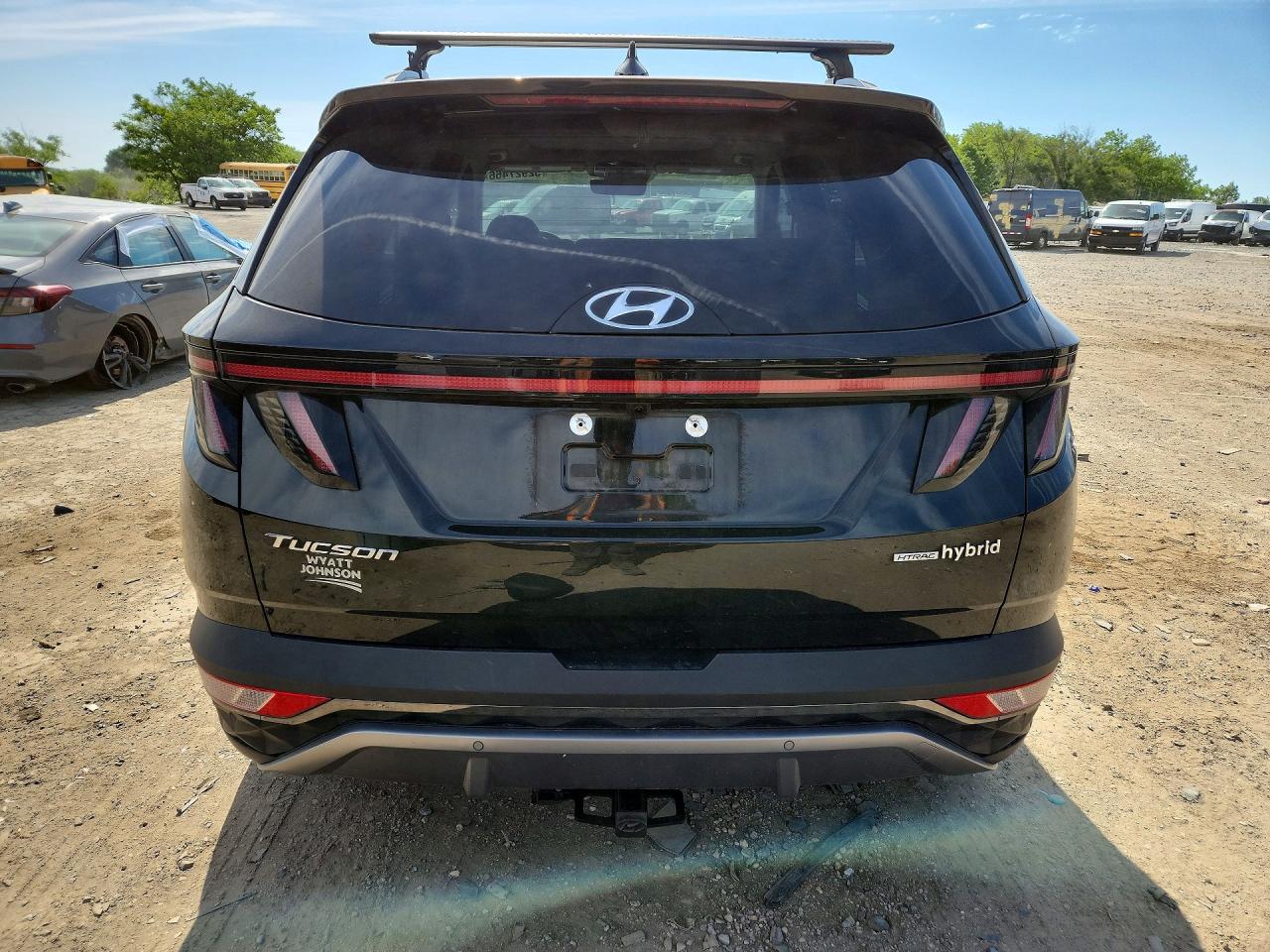Купить б/у HYUNDAI TUCSON HYBRID 2022 года из США